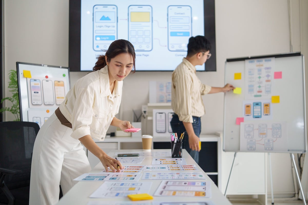 UX designer planning on sticky notes